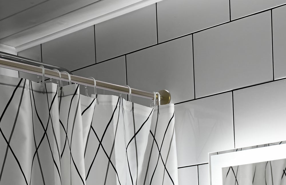 Brass Shower Curtain Accessories Complete the Bathroom